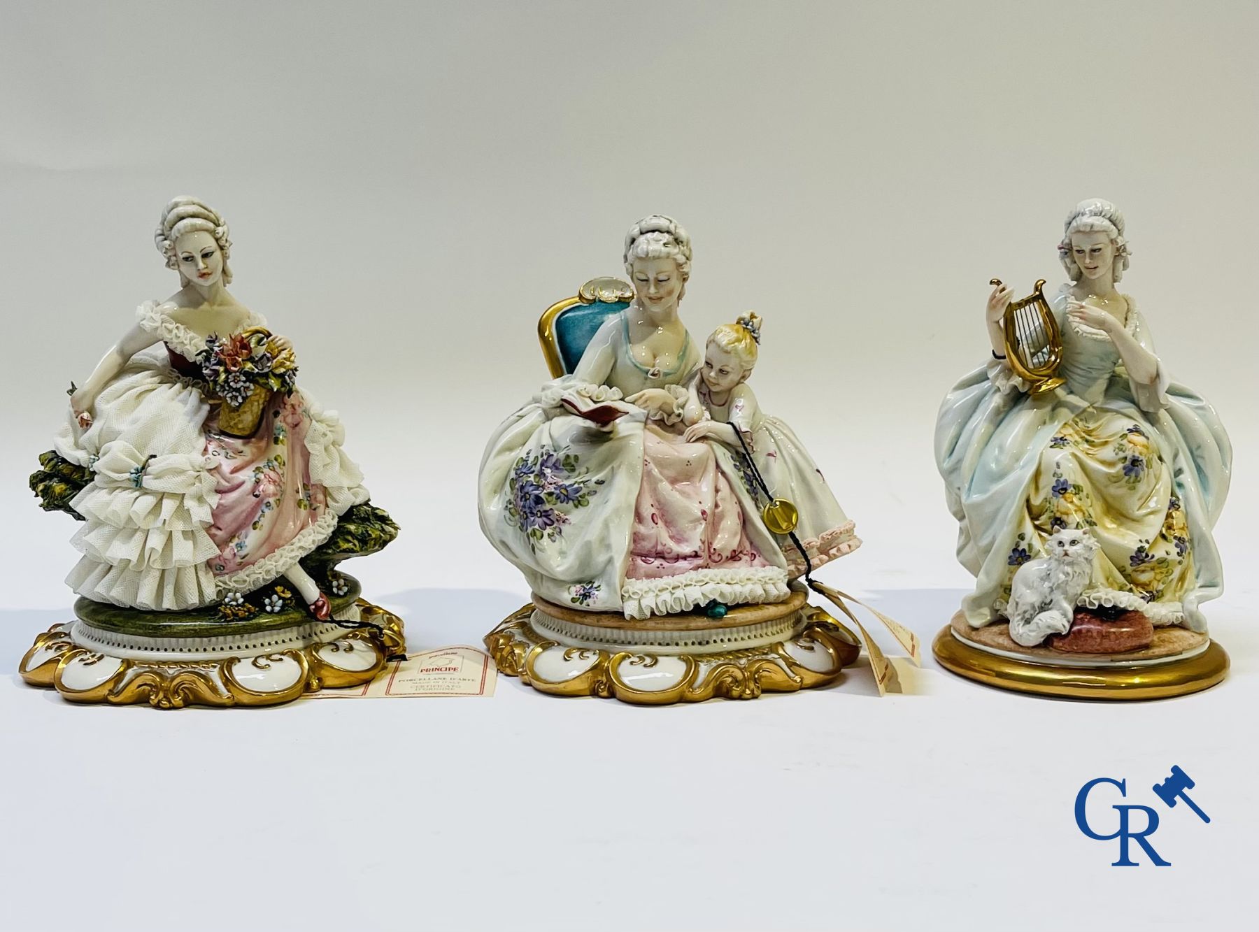 Porcelain: Capodimonte: 3 groups in Italian porcelain with lace.
