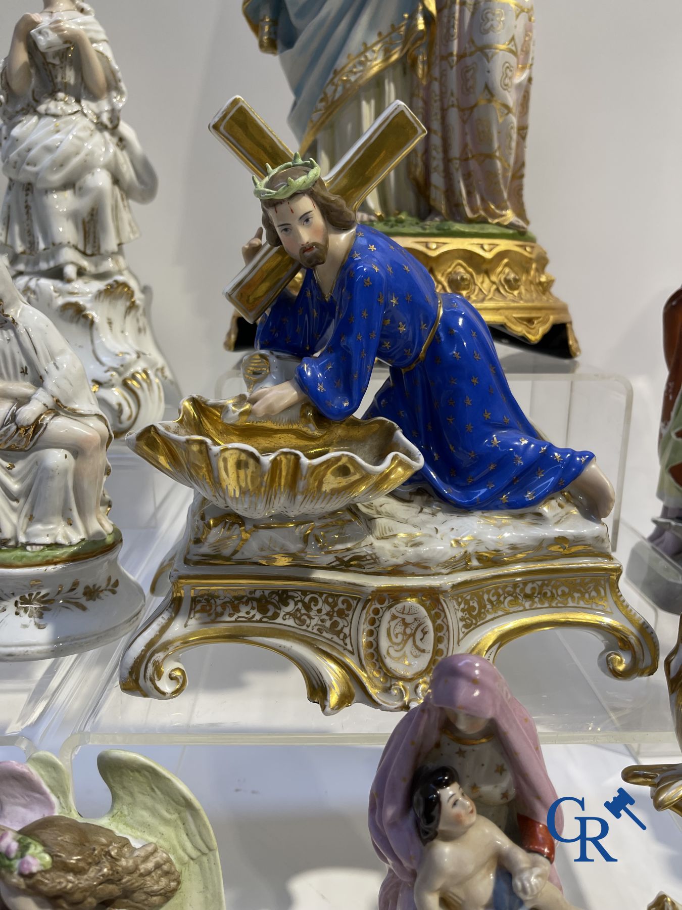 A various lot holy water barrels, shrines and others in porcelain and biscuit.