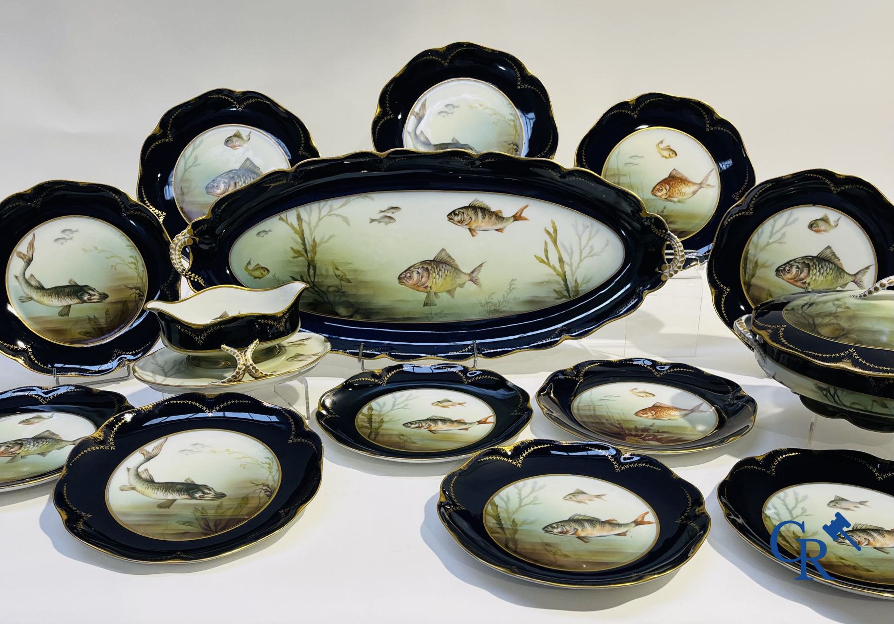 Porcelain: Tableware with a fish decor in Rosenthal porcelain.