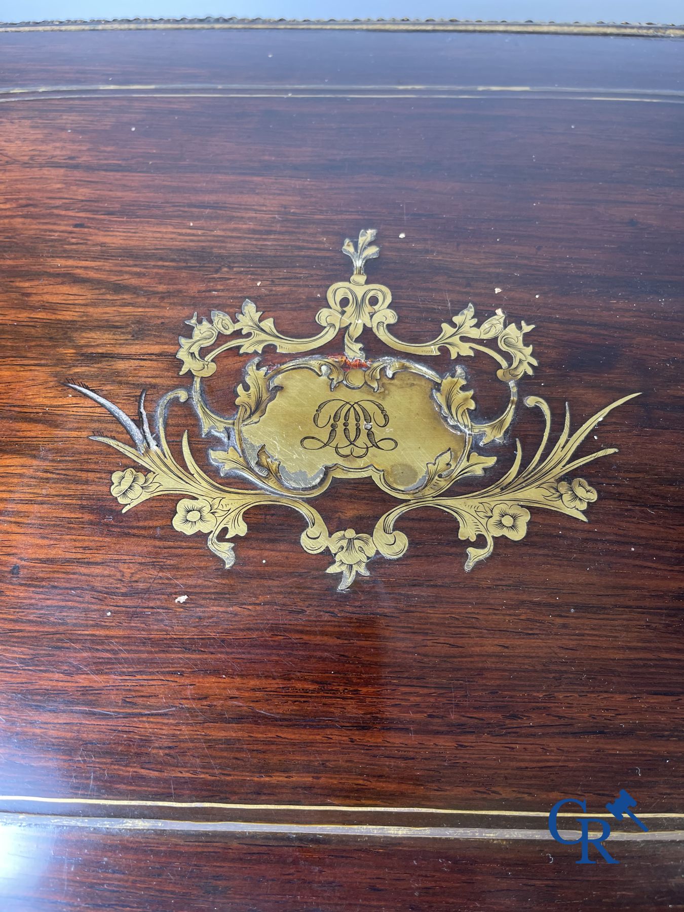 An imposing rosewood liqueur case with bronze fittings and inlays in Boulle style. 19th century.