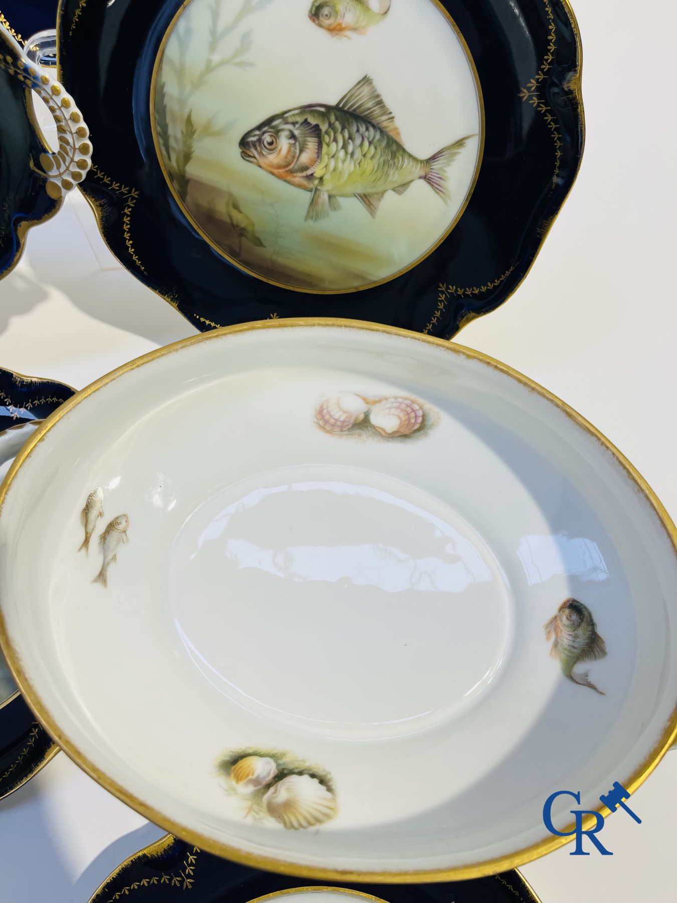 Porcelain: Tableware with a fish decor in Rosenthal porcelain.