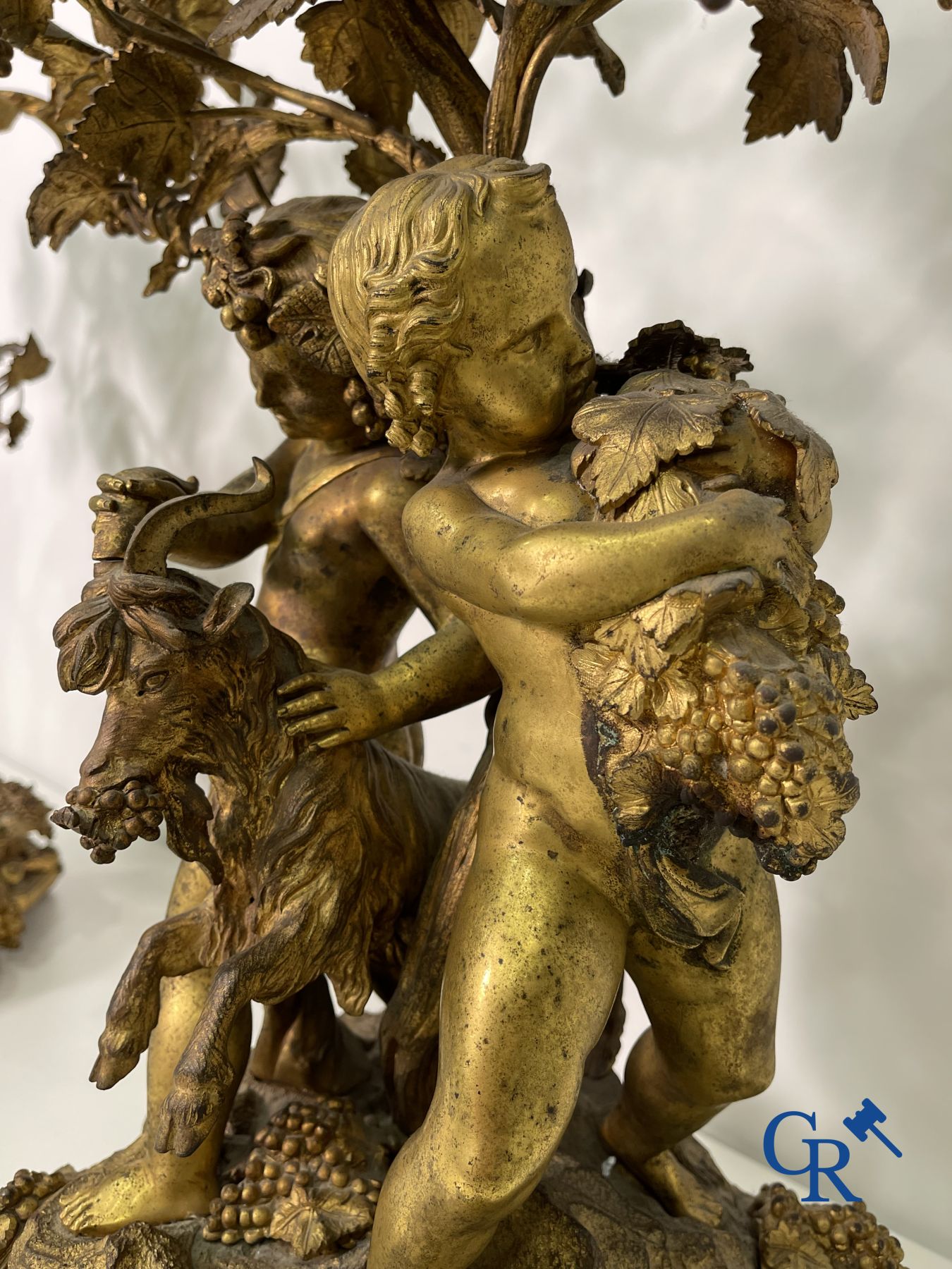 A pair of imposing bronze candlesticks with putti in LXVI style. Napoleon III period.