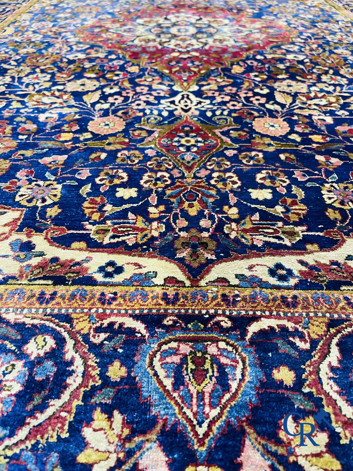 Oriental carpets: Antique silk carpet with floral decor.