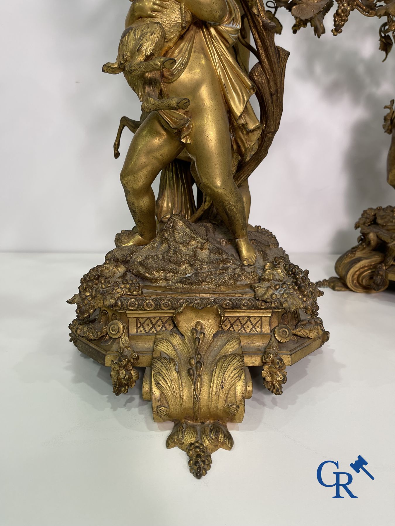 A pair of imposing bronze candlesticks with putti in LXVI style. Napoleon III period.