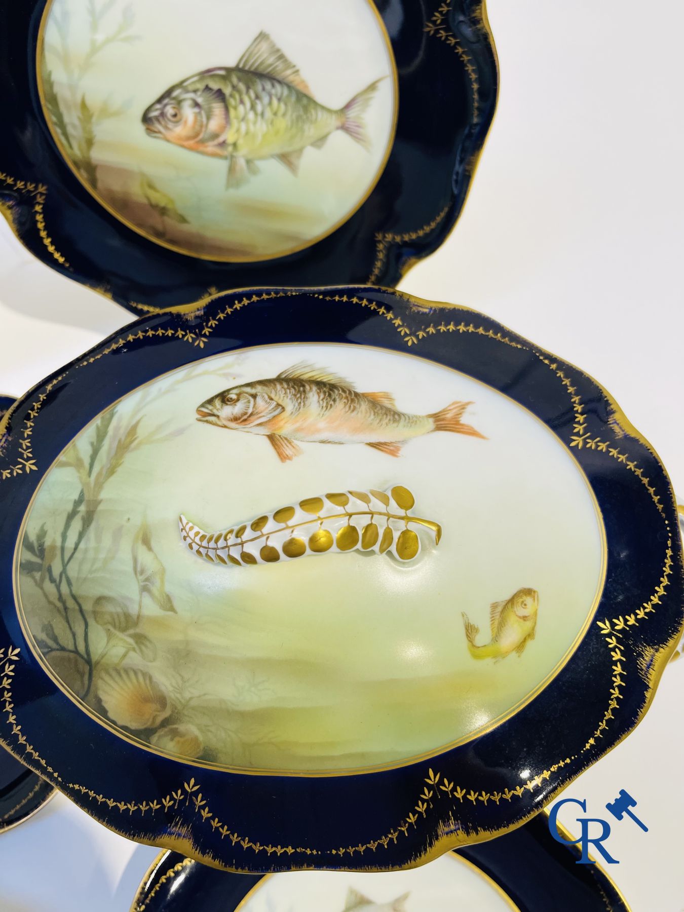 Porcelain: Tableware with a fish decor in Rosenthal porcelain.