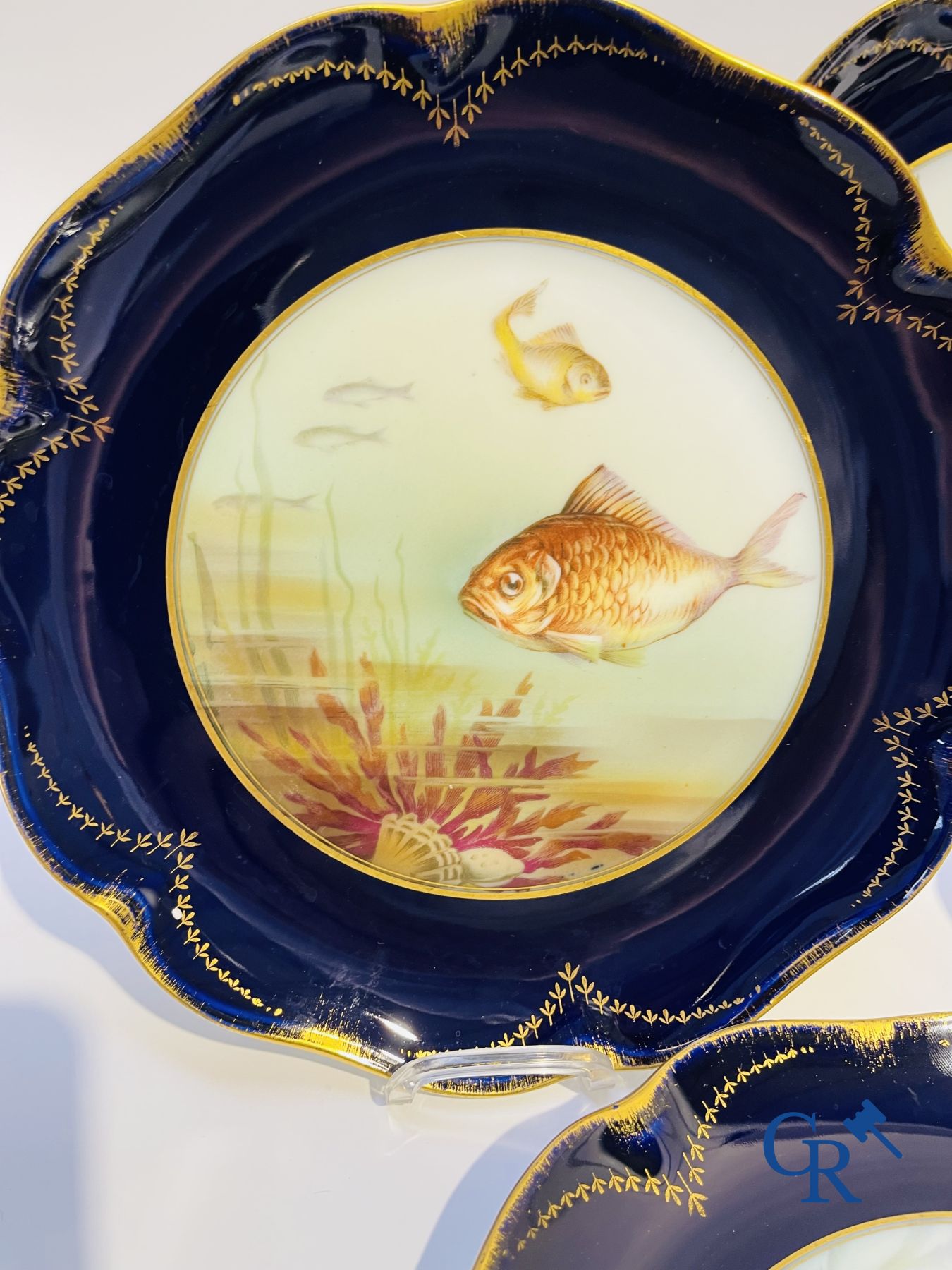 Porcelain: Tableware with a fish decor in Rosenthal porcelain.