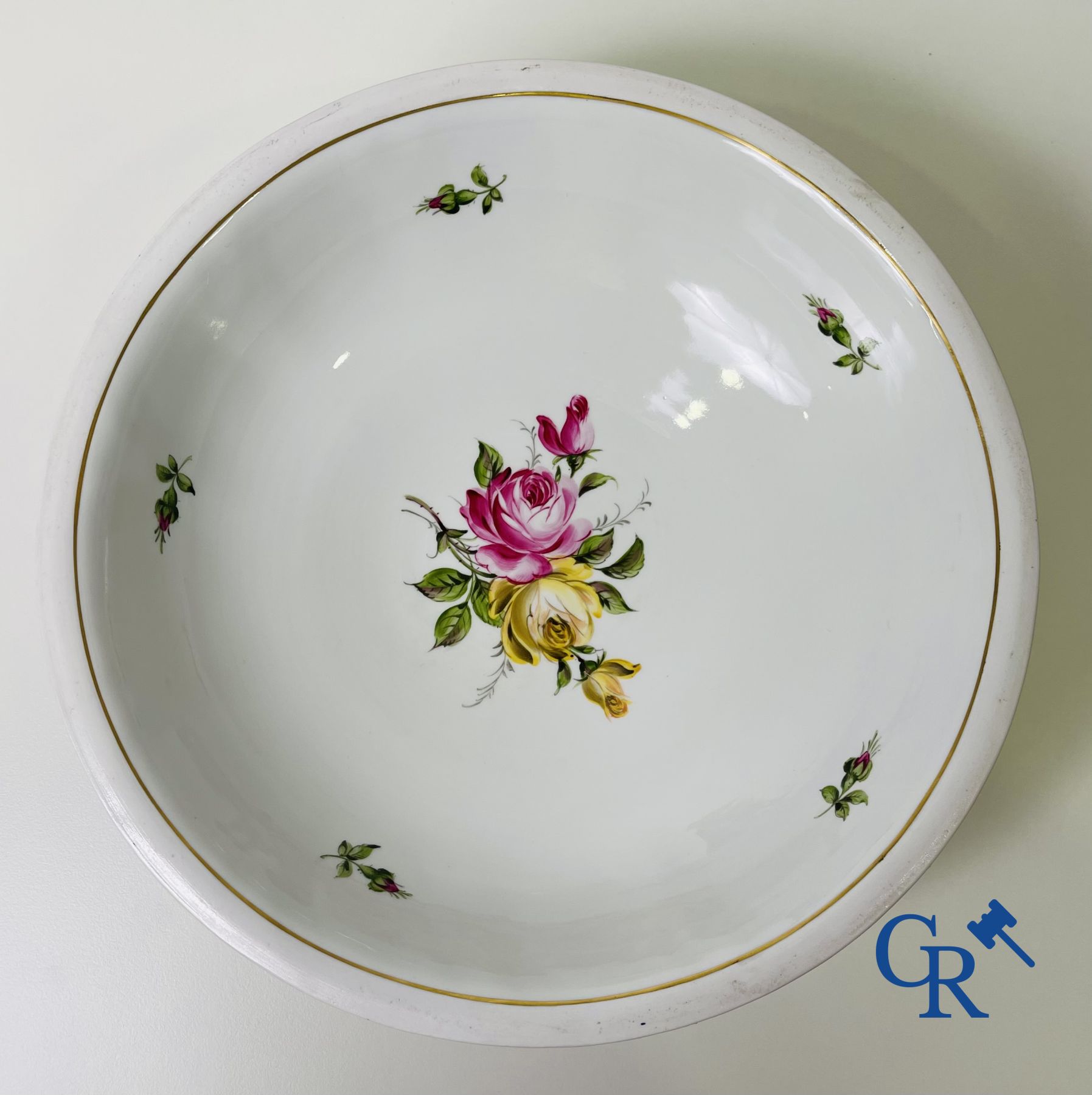 A pair of table centrepieces in German polychrome porcelain.