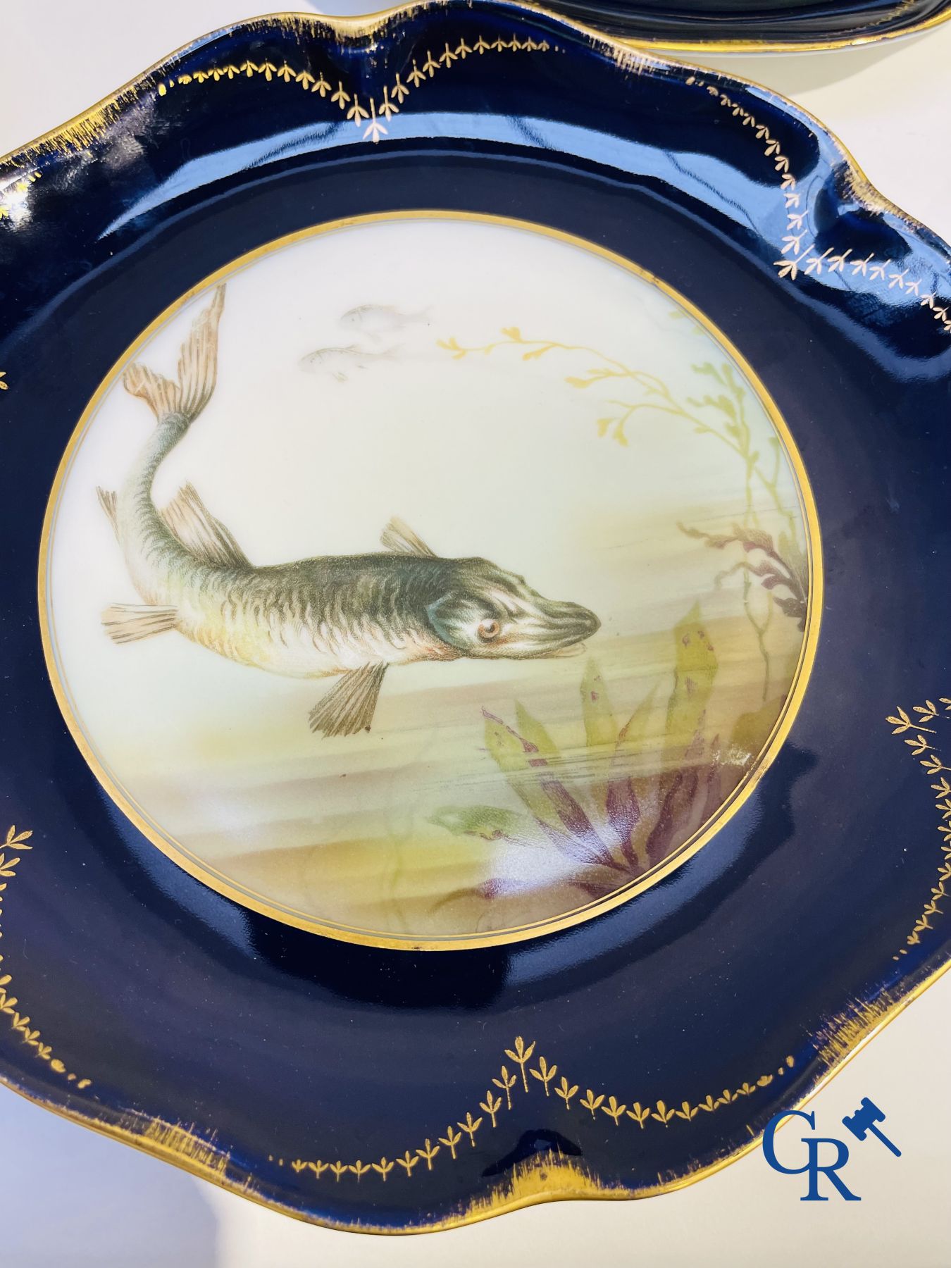 Porcelain: Tableware with a fish decor in Rosenthal porcelain.