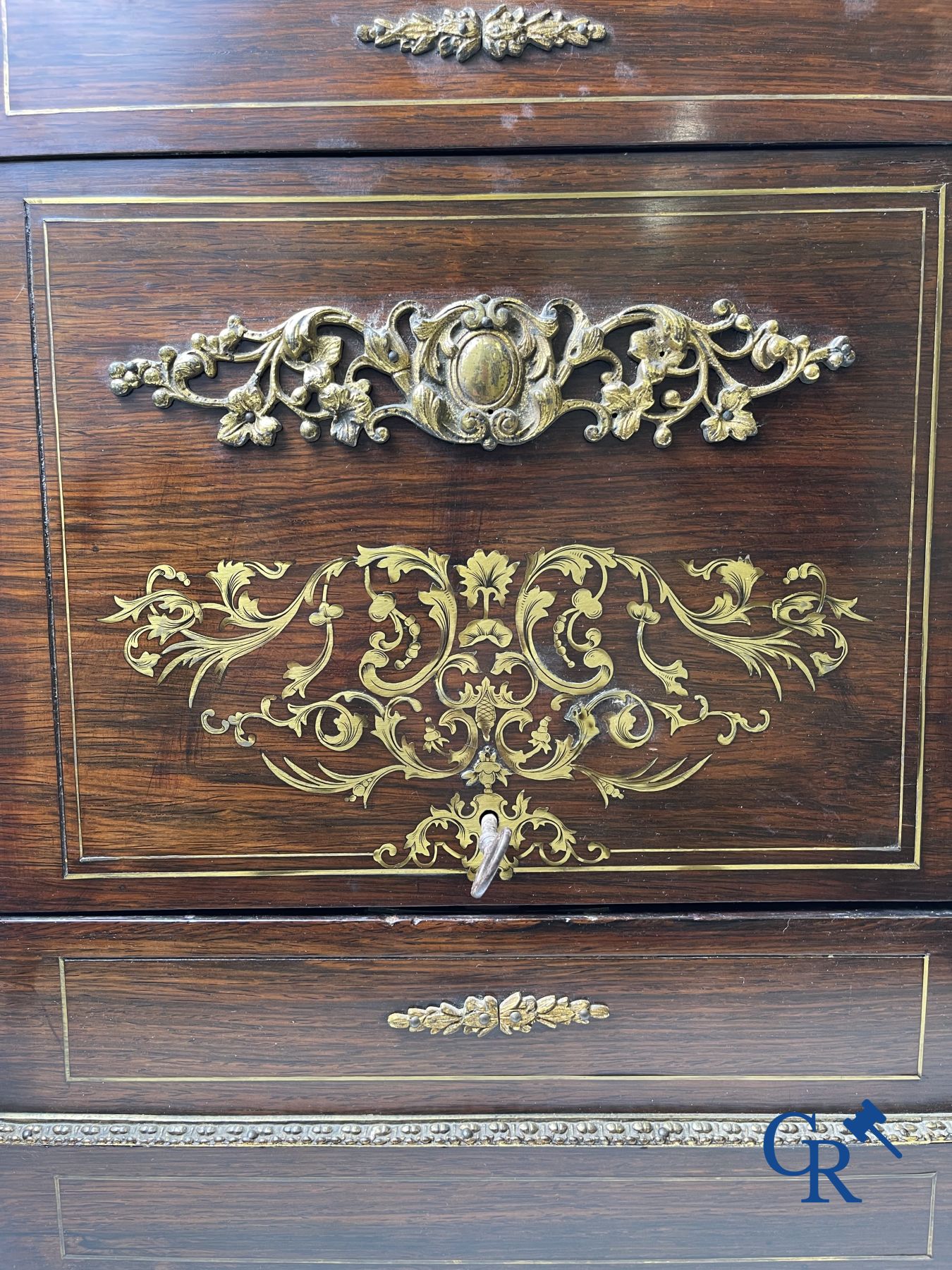 An imposing rosewood liqueur case with bronze fittings and inlays in Boulle style. 19th century.