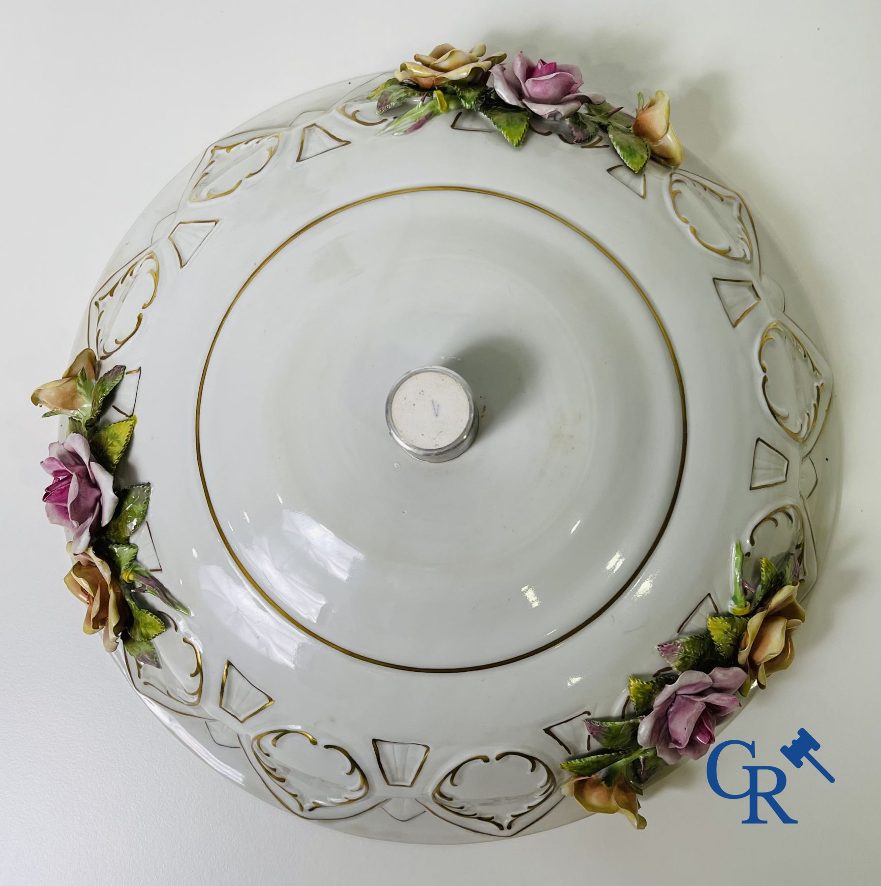 A pair of table centrepieces in German polychrome porcelain.