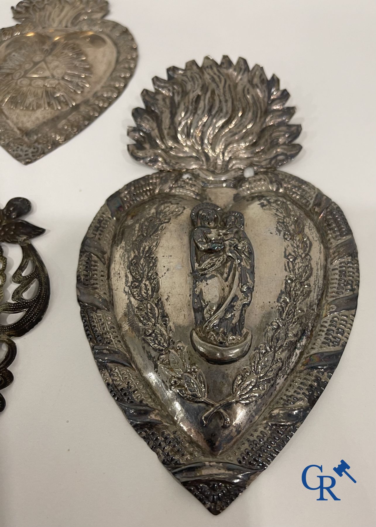 A lot of 9 pieces of various religious objects in silver. 18th-19th century