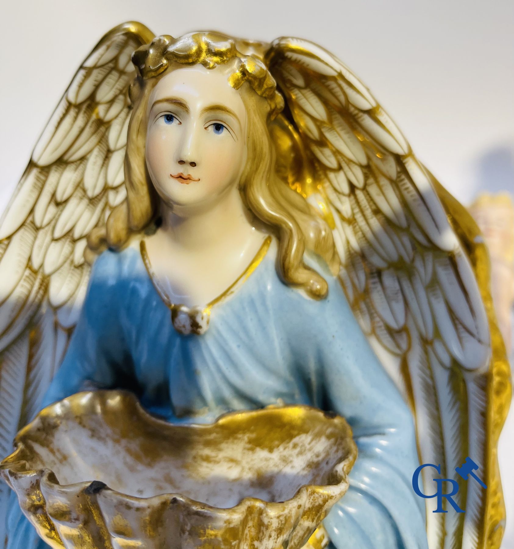 A various lot holy water barrels, shrines and others in porcelain and biscuit.