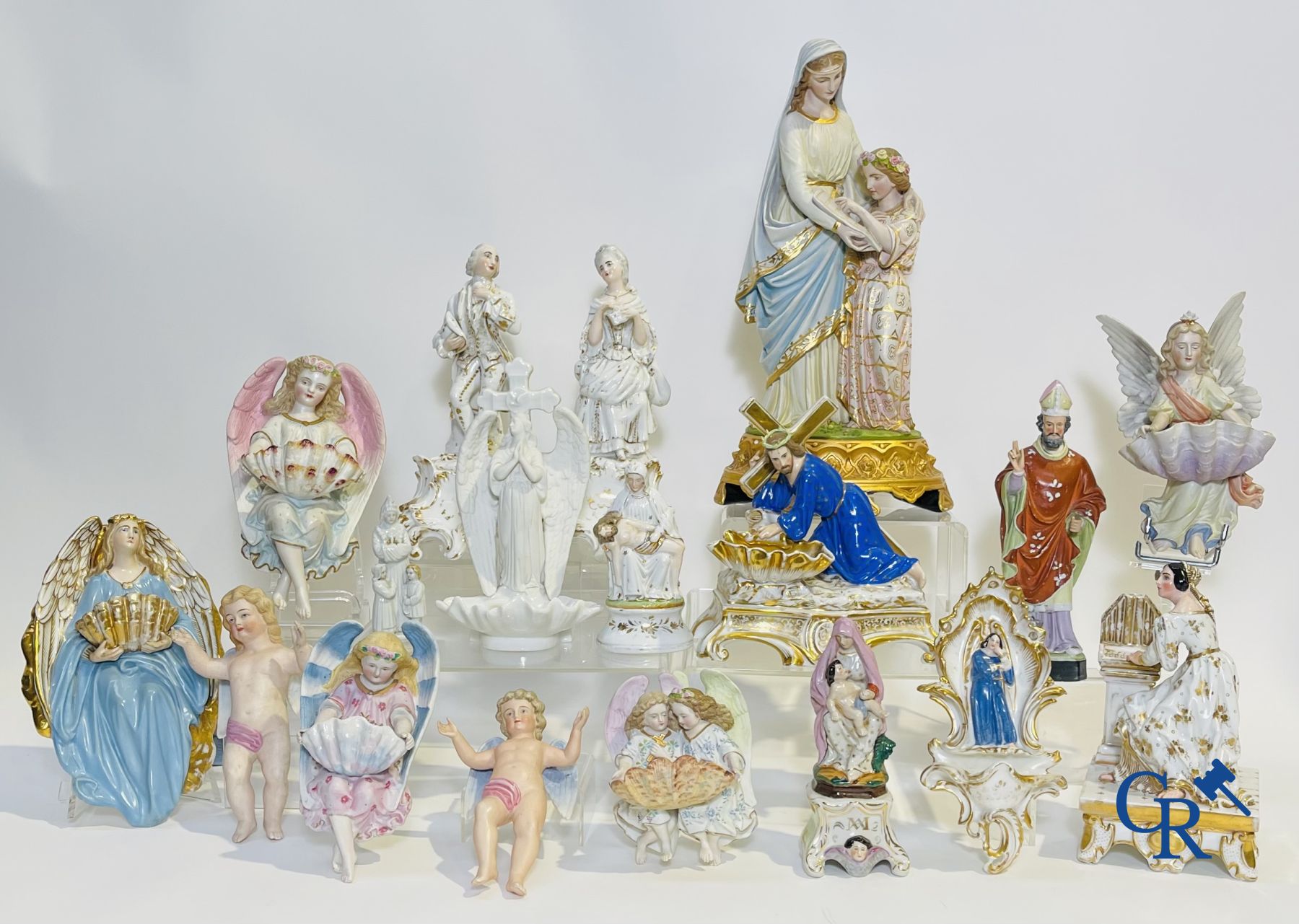 A various lot holy water barrels, shrines and others in porcelain and biscuit.