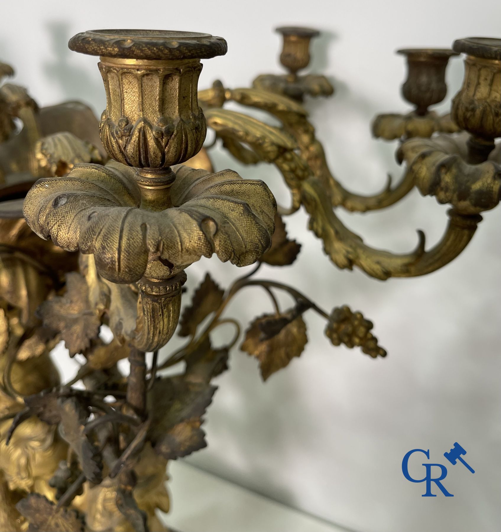 A pair of imposing bronze candlesticks with putti in LXVI style. Napoleon III period.