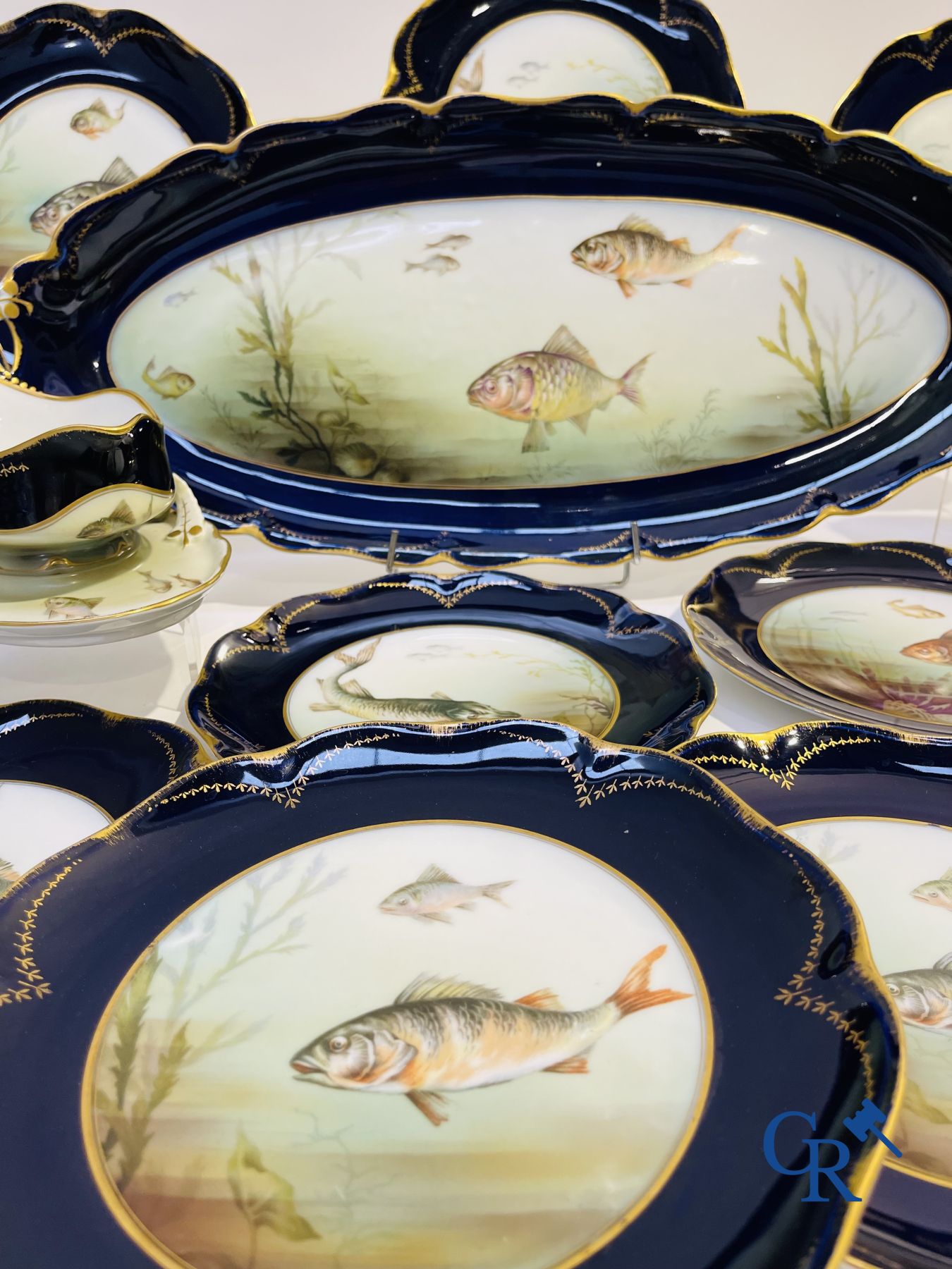 Porcelain: Tableware with a fish decor in Rosenthal porcelain.