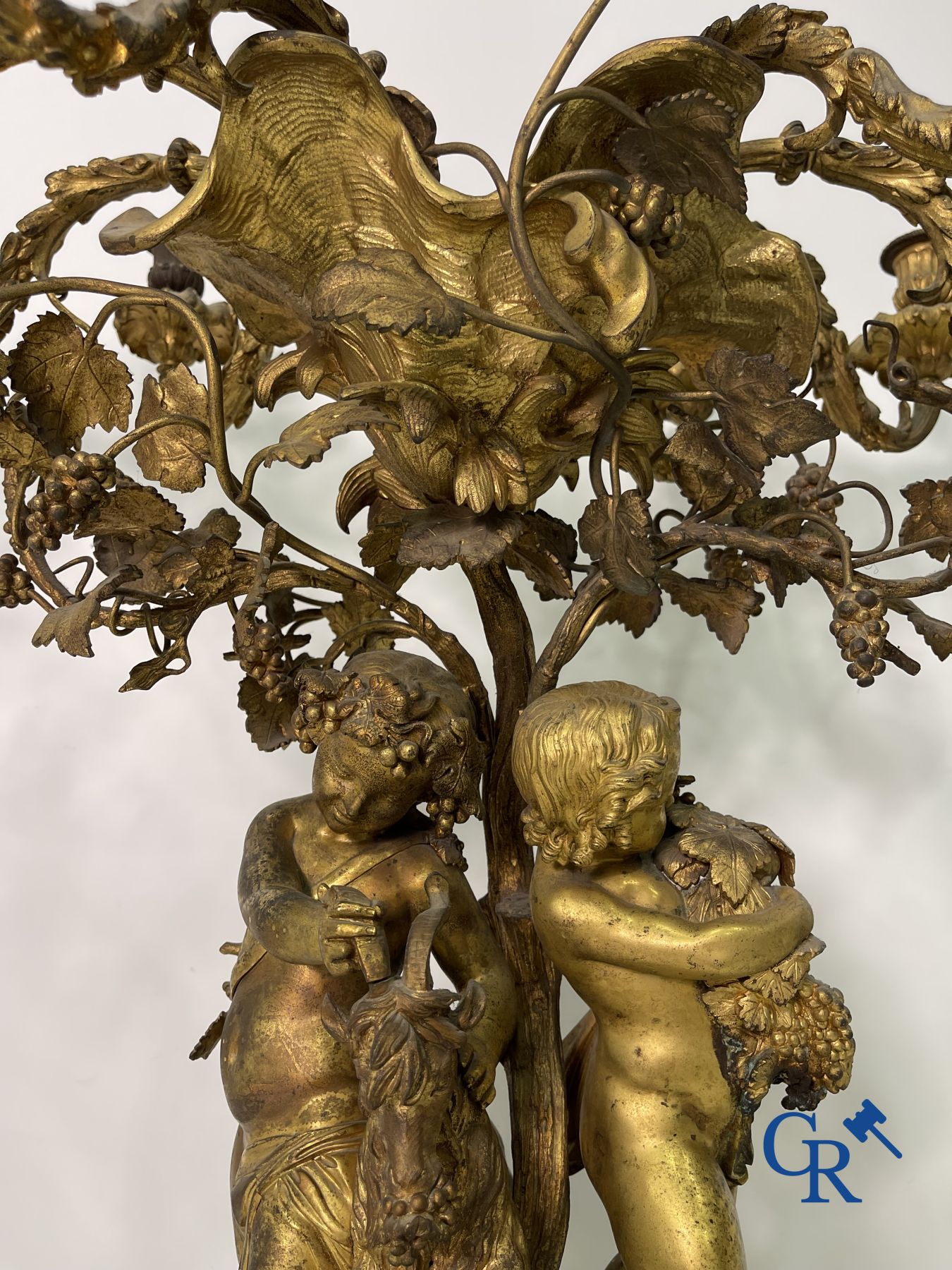 A pair of imposing bronze candlesticks with putti in LXVI style. Napoleon III period.