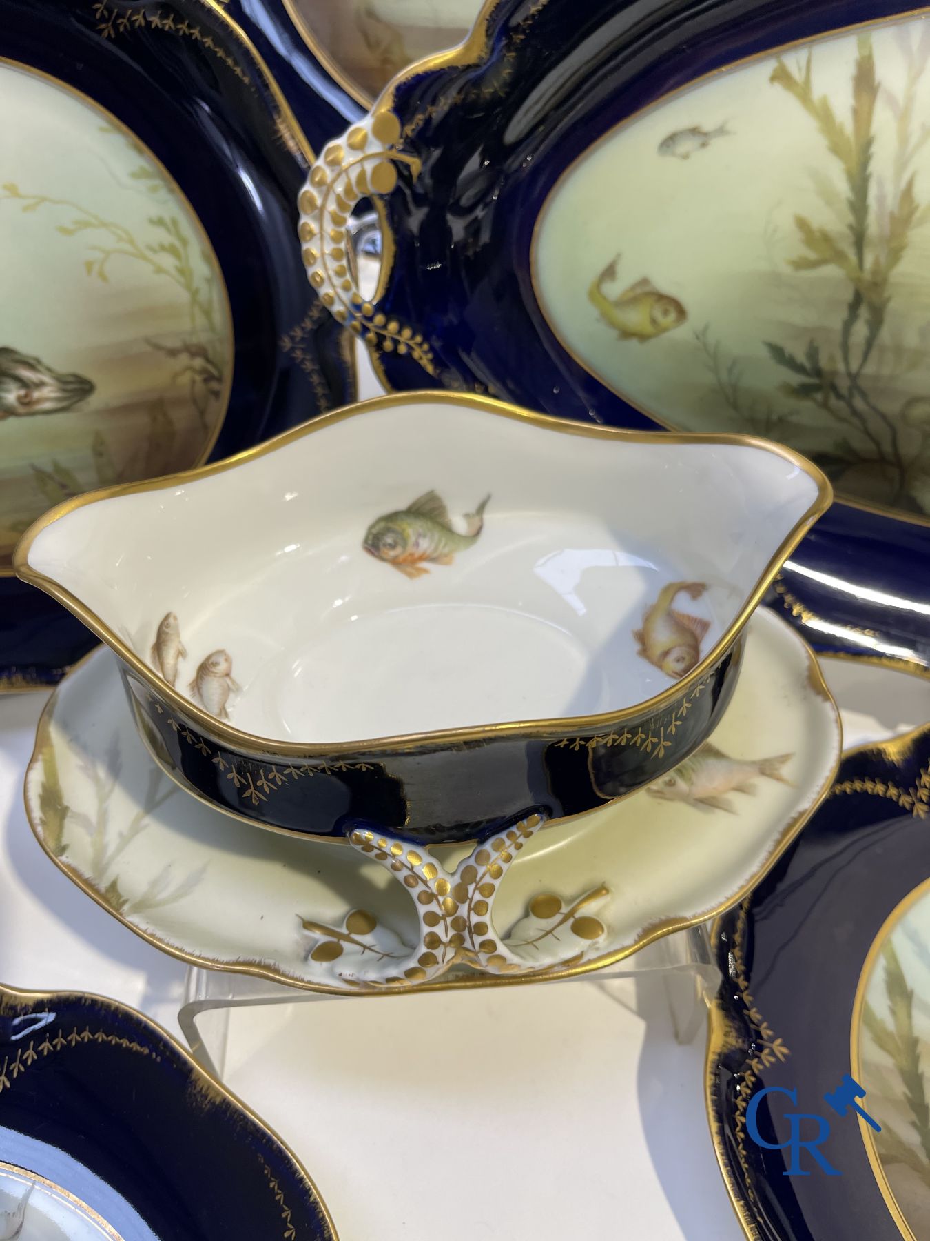 Porcelain: Tableware with a fish decor in Rosenthal porcelain.
