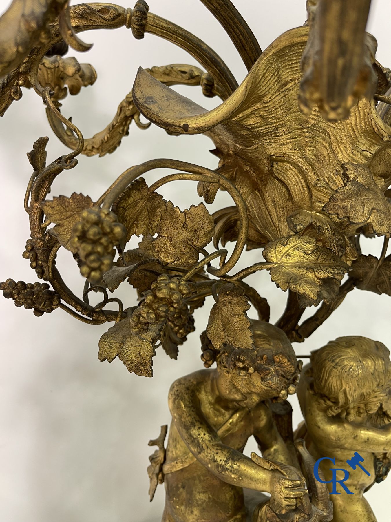 A pair of imposing bronze candlesticks with putti in LXVI style. Napoleon III period.