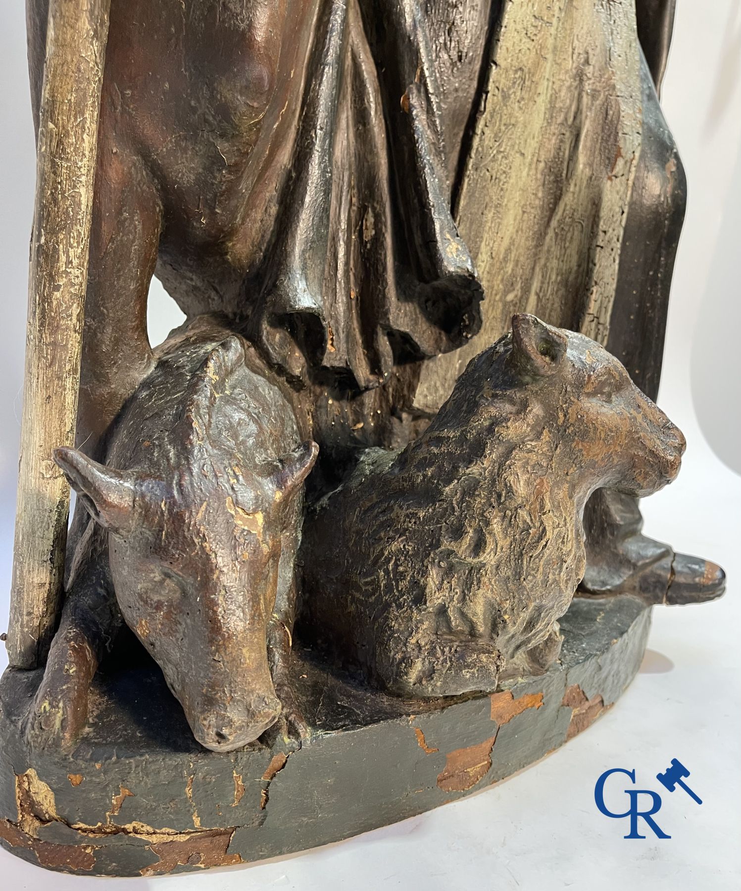 Imposing 17th century polychrome wooden statue of a Saint accompanied by a cow, a pig and a sheep.