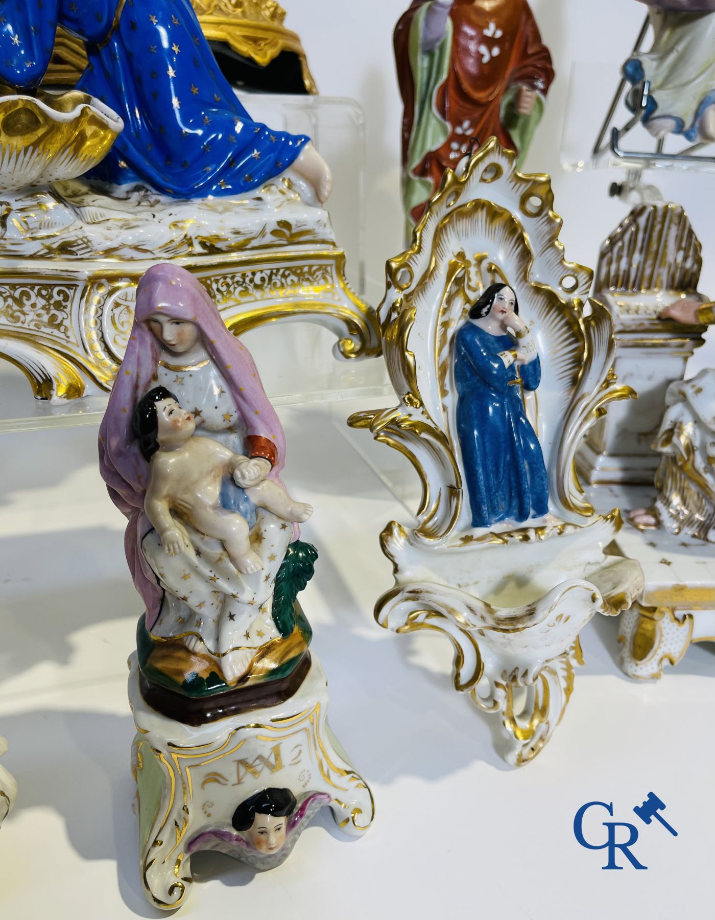 A various lot holy water barrels, shrines and others in porcelain and biscuit.