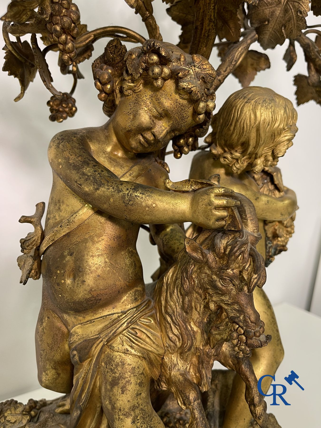 A pair of imposing bronze candlesticks with putti in LXVI style. Napoleon III period.