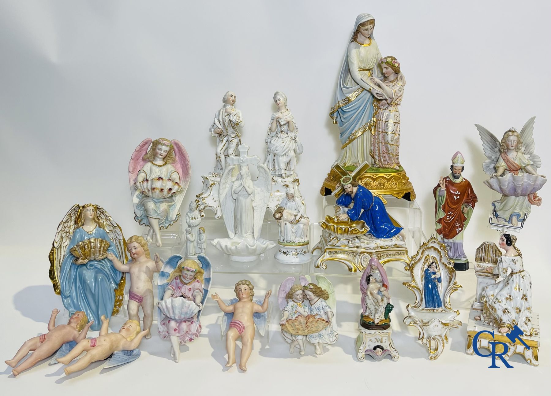 A various lot holy water barrels, shrines and others in porcelain and biscuit.