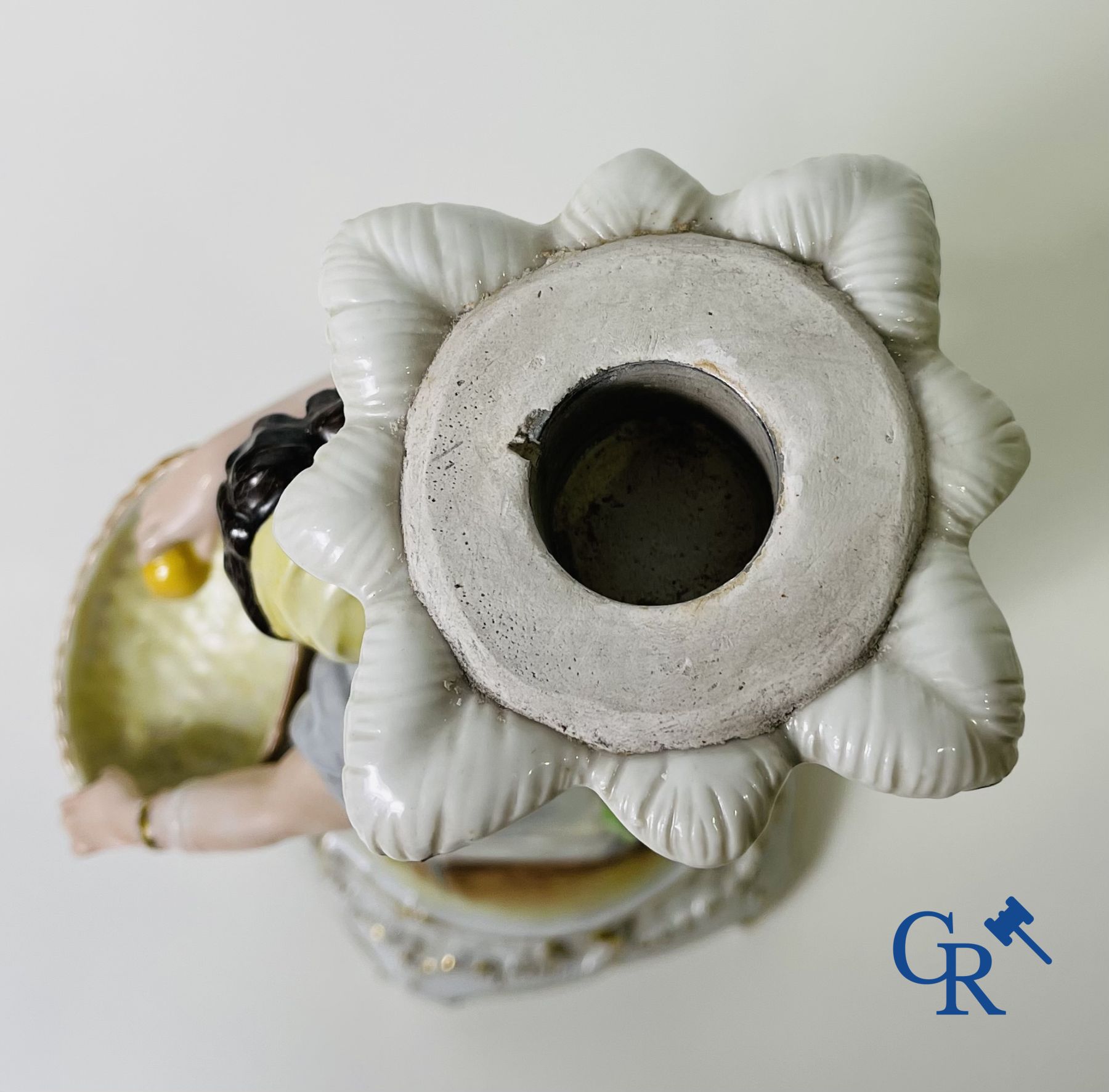 A pair of table centrepieces in German polychrome porcelain.