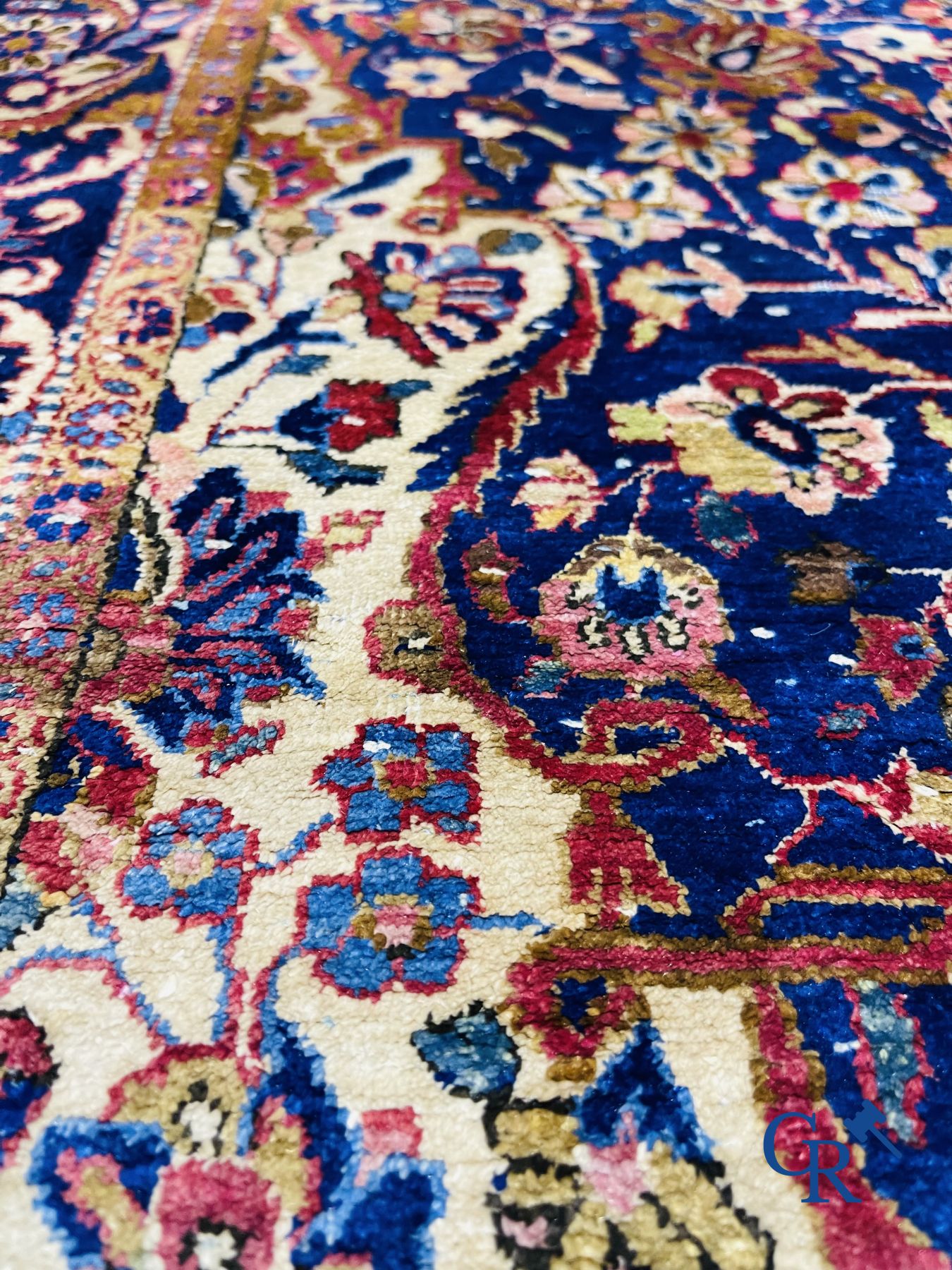 Oriental carpets: Antique silk carpet with floral decor.