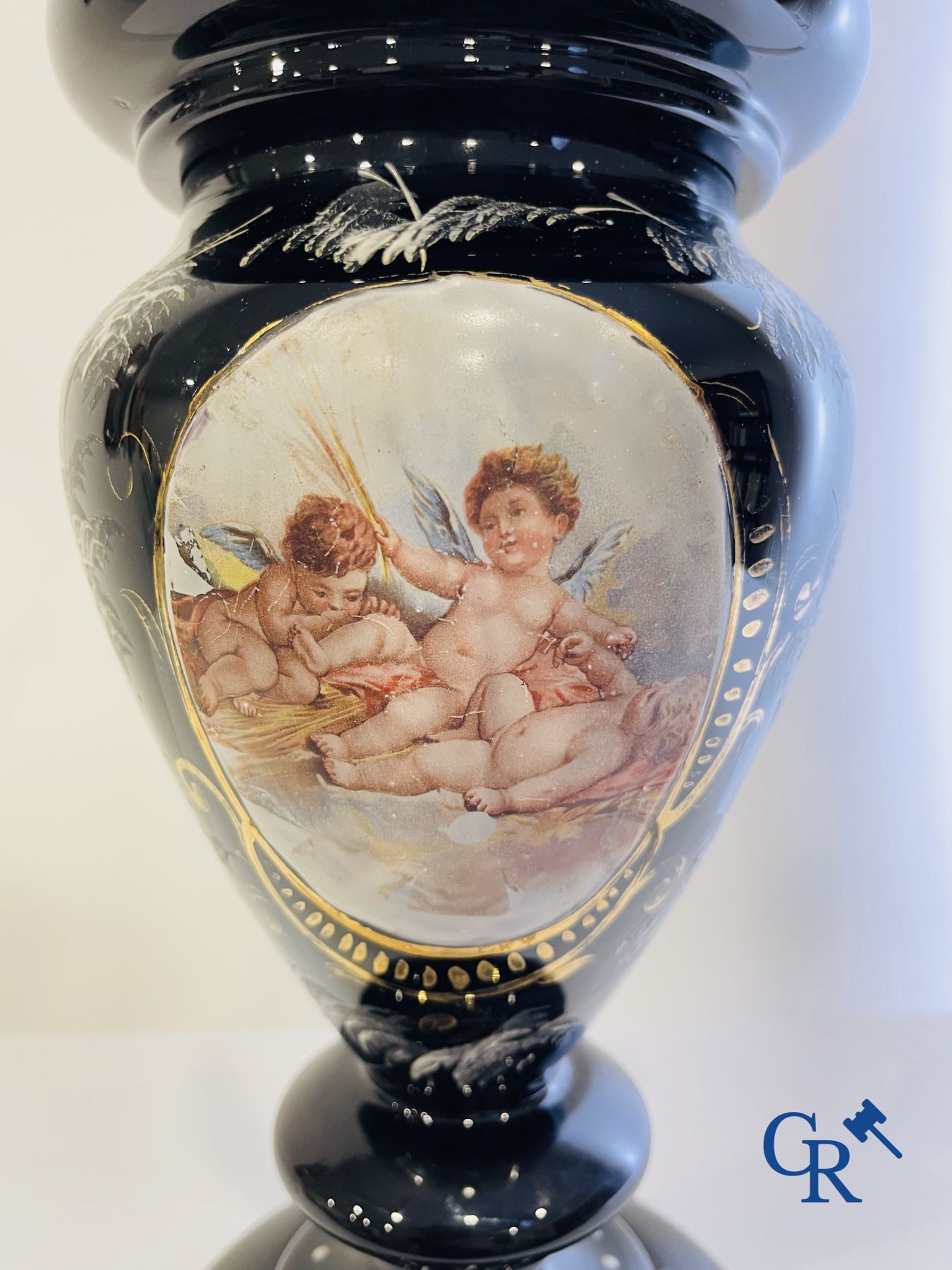 Pair of oil lamps in black opaline with enamelled decor.